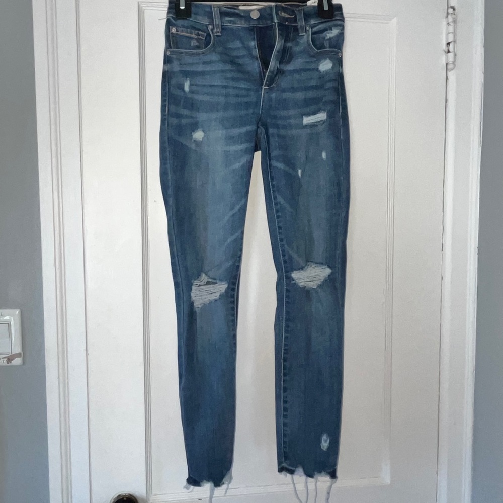 GARAGE skinny distressed low rise jeans